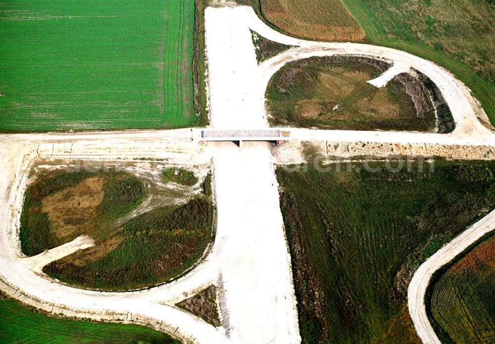 Aerial photograph Trebbin / Brandenburg - Mit den Bauarbeiten an der Umfahrung soll nun im April 2004 begonnen werden. Der Termin für die Fertigstellung dieses Abschnitts ist auf Mitte 2006 verschoben. Markt 1 - 3, 14959 Trebbin, Telefon: +49 33731 / 8420,Telefax: +49 33731 / 230911, Achim Walder: