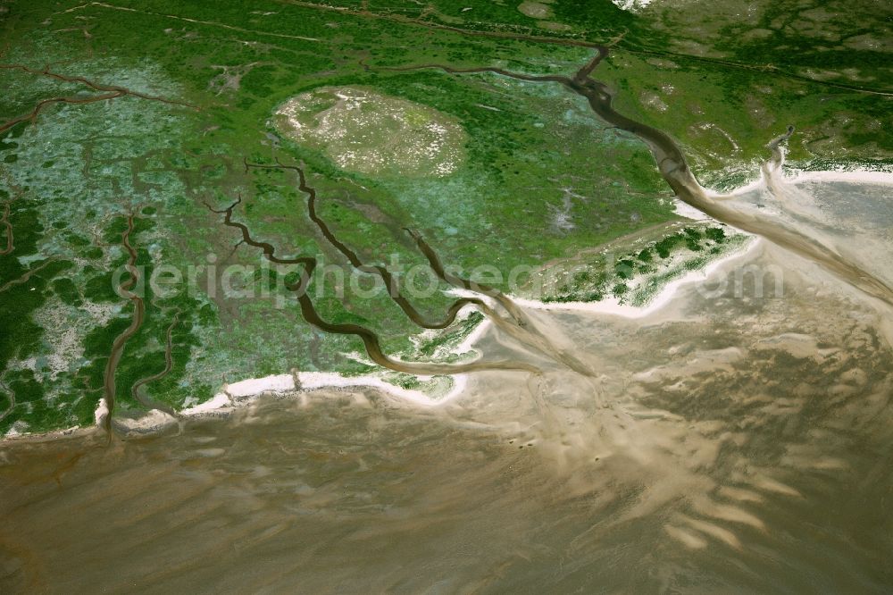 Norderney from above - A tidal creek is a natural watercourse in the mud and into the marsh. He may be the continuation of a creek of land on the mud flats at low tide, or several separate parts of the sea together. Several areas of the Norderney belong to the National Park Wadden Sea