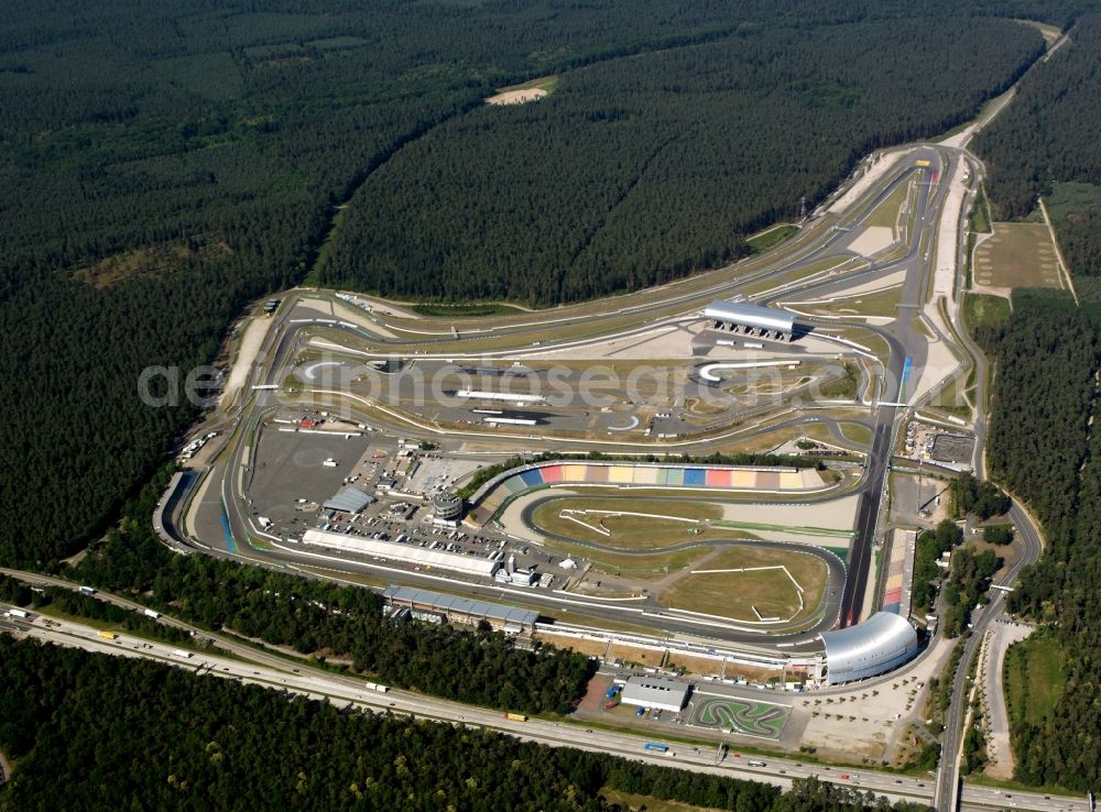 Aerial image Hockenheim - View of the Hockenheim racetrack in Baden-Wuerttemberg, which was also called Kurpfalzring. The first original track was built in 1932. In 1970, the Formula 1 took place for the first time. In 2002, the track was renovated and simultaneously shortened. The ring is also used for events and is operated by the Hockenheim-Ring GmbH