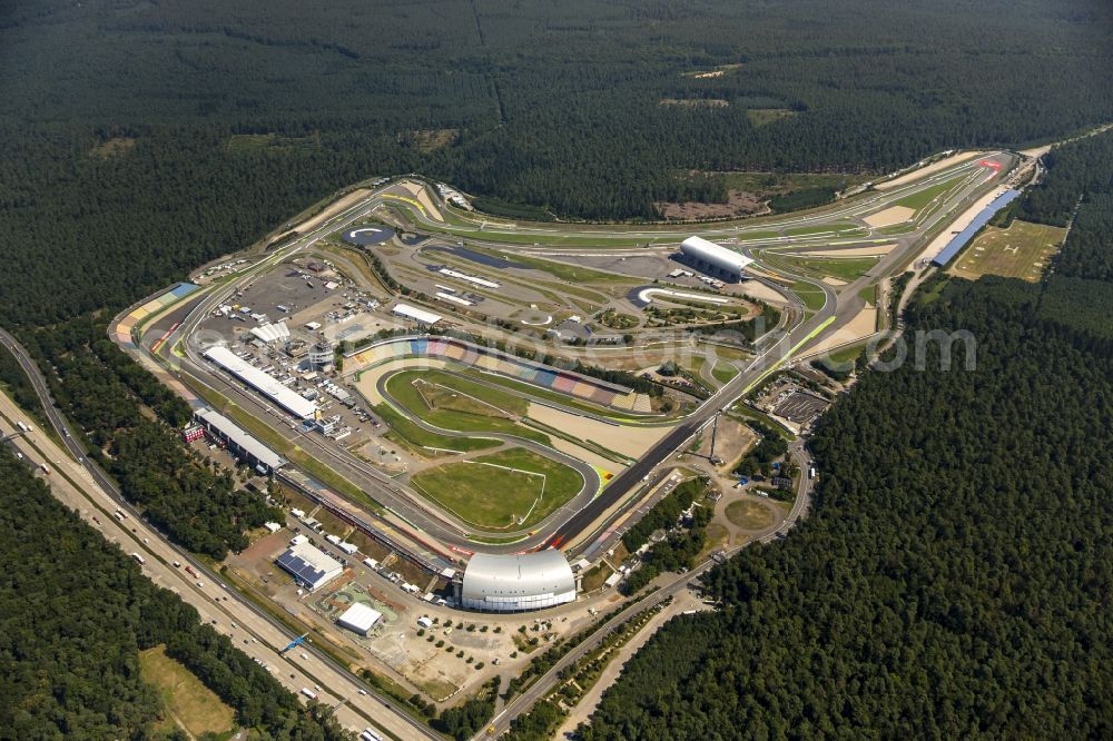 Aerial image Hockenheim - View of the Hockenheim racetrack in Baden-Wuerttemberg, which was also called Kurpfalzring. The first original track was built in 1932. In 1970, the Formula 1 took place for the first time. In 2002, the track was renovated and simultaneously shortened. The ring is also used for events and is operated by the Hockenheim-Ring GmbH