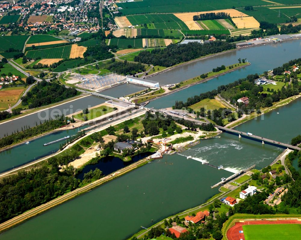 Volgelsheim from the bird's eye view: The Rhine island and the river on the border between Germany and France in the French borough of Volgelsheim. The river is also the border between the state of Baden-Württemberg and the region of Elsace. The island - called Ile du Rhin in French - connects both countries by the Rhine bridge. View from the German side on the Rhine and the Grand Canal d'Alsace