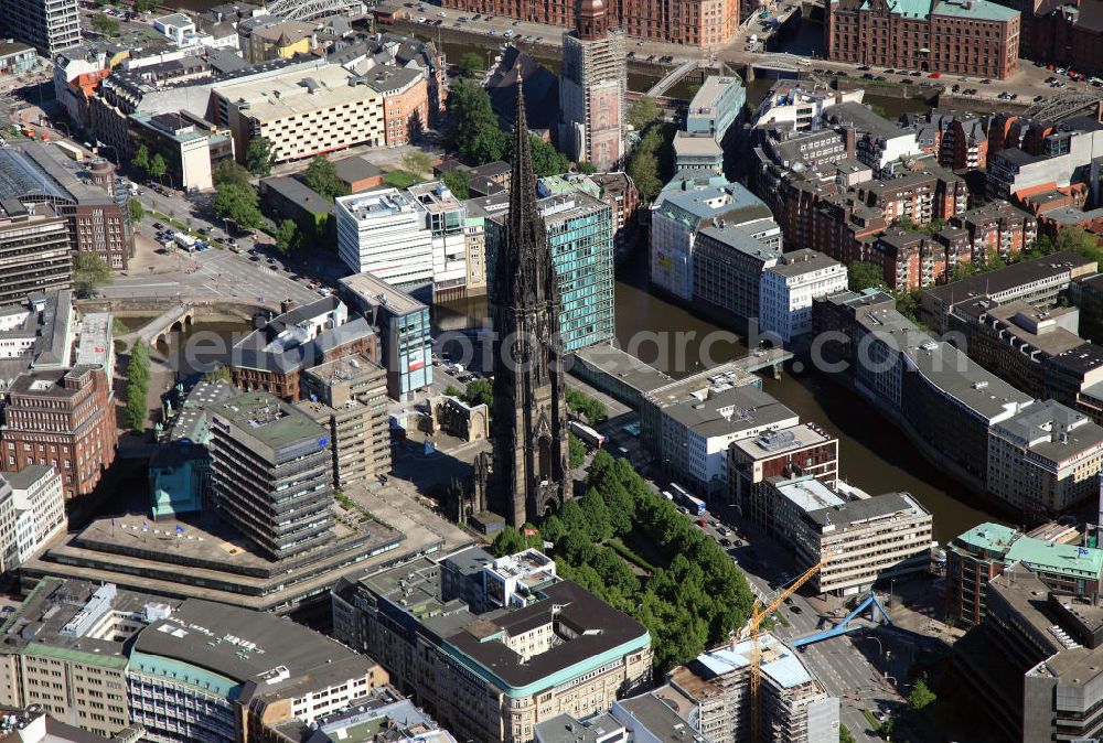 Hamburg from above - The remains of the old St. Nicolai church are acting as a memorial for the victims of war and tyranny between 1933 and 1945. Prior to its destruction in 1943 the building was one of the five main churches in Hamburg. Its church spire is still the third largest in Germany and the five highest in the world