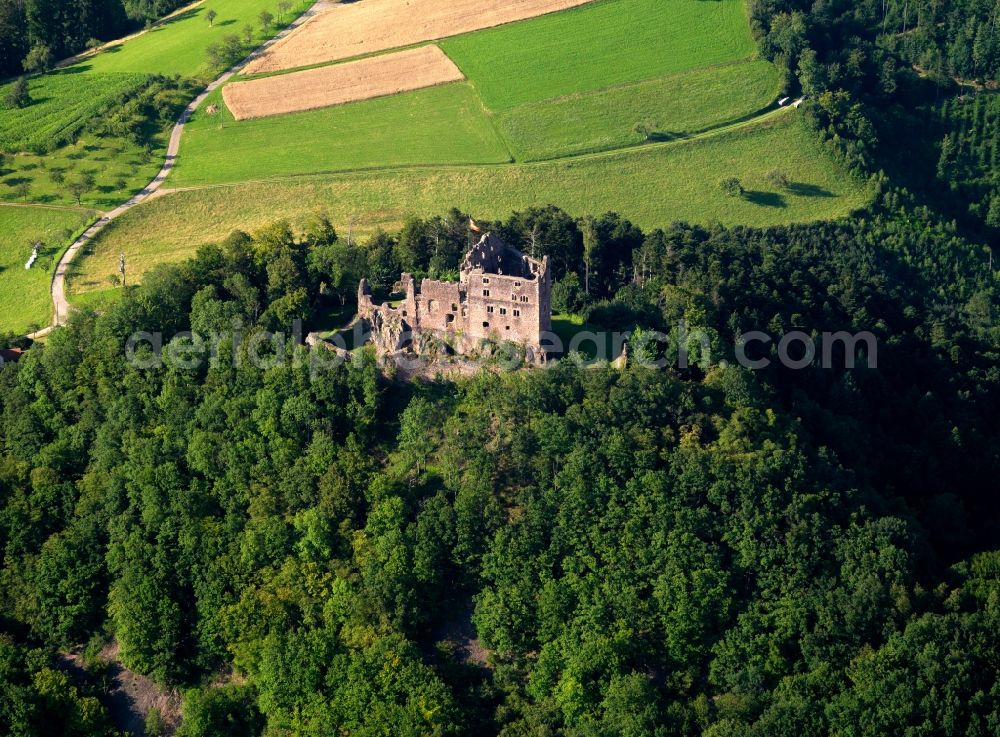 Aerial photograph Seelbach - The ruins of fortress Hohengeroldseck in the Schönberg part of the borough of Seelbach in the state of Baden-Württemberg. The ruin and its remains are located in the Black Forest, on a hill between two valleys. The castle was originally built in 1260 and is currently refurbished and renovated. It is considered an important cultural heritage site of the region