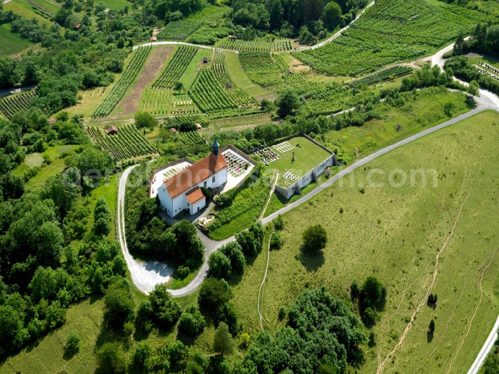 Tübingen from above - The Wurmlinger chapel on the hill near by Chapel Tübingen is a very popular tourist and pilgrimage destination. The Romanesque previous building was 1050 in the tenure of Pope Leo IX. as a grave chapel of the founder, Count Anselm of Calw built there. The Romanesque crypt dates from around 1150. The Gothic successor building burned down in 1644th The Baroque chapel still standing today was inaugurated 1685th