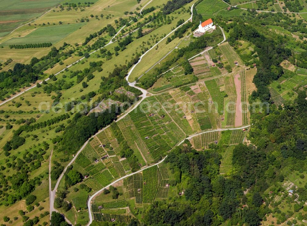 Tübingen from the bird's eye view: The Wurmlinger chapel on the hill near by Chapel Tübingen is a very popular tourist and pilgrimage destination. The Romanesque previous building was 1050 in the tenure of Pope Leo IX. as a grave chapel of the founder, Count Anselm of Calw built there. The Romanesque crypt dates from around 1150. The Gothic successor building burned down in 1644th The Baroque chapel still standing today was inaugurated 1685th