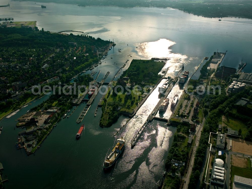 Kiel from the bird's eye view: The watergate of the North-East Sea Channel in Brunsbüttel in the state of Schleswig-Holstein. The lock is located at the city limits and end point of the channel. The channel is the most used artificial water way in the world. The watergate is an important tourist site today