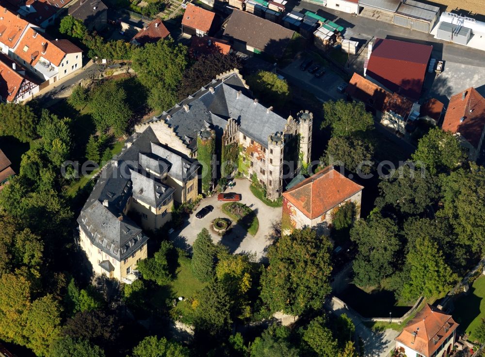 Thüngen from the bird's eye view: The castle of Thüngen in the state of Bavaria. The compound actually consists of several connected castles and buildings that were connected and redesigned. It was the seat of the lords of Thüngen and is located on a hill in the historic center of the city