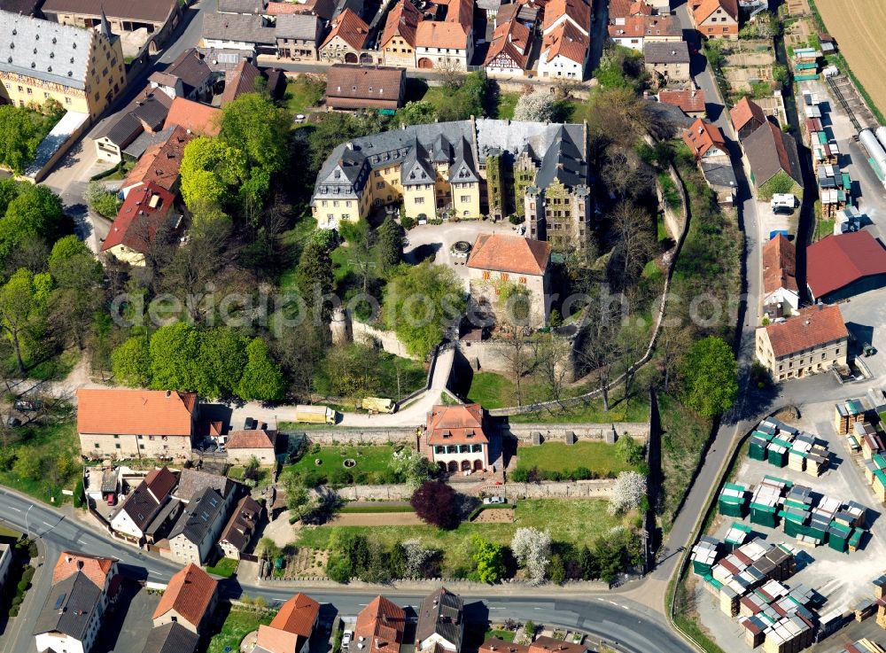 Aerial photograph Thüngen - The castle of Thüngen in the state of Bavaria. The compound actually consists of several connected castles and buildings that were connected and redesigned. It was the seat of the lords of Thüngen and is located on a hill in the historic center of the city