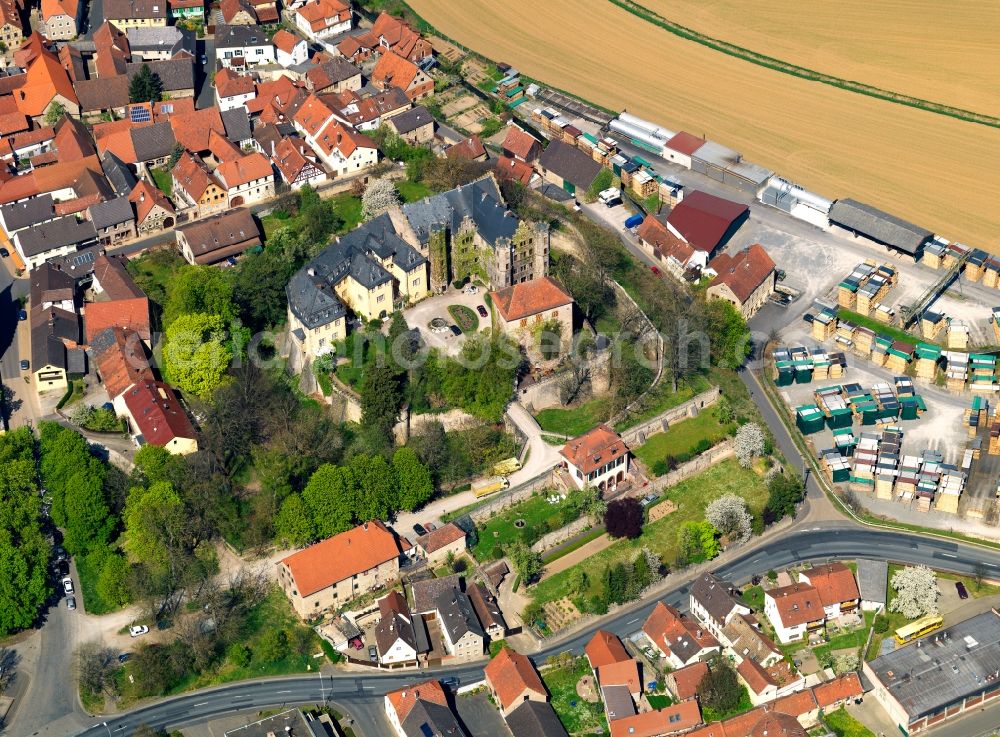 Thüngen from above - The castle of Thüngen in the state of Bavaria. The compound actually consists of several connected castles and buildings that were connected and redesigned. It was the seat of the lords of Thüngen and is located on a hill in the historic center of the city