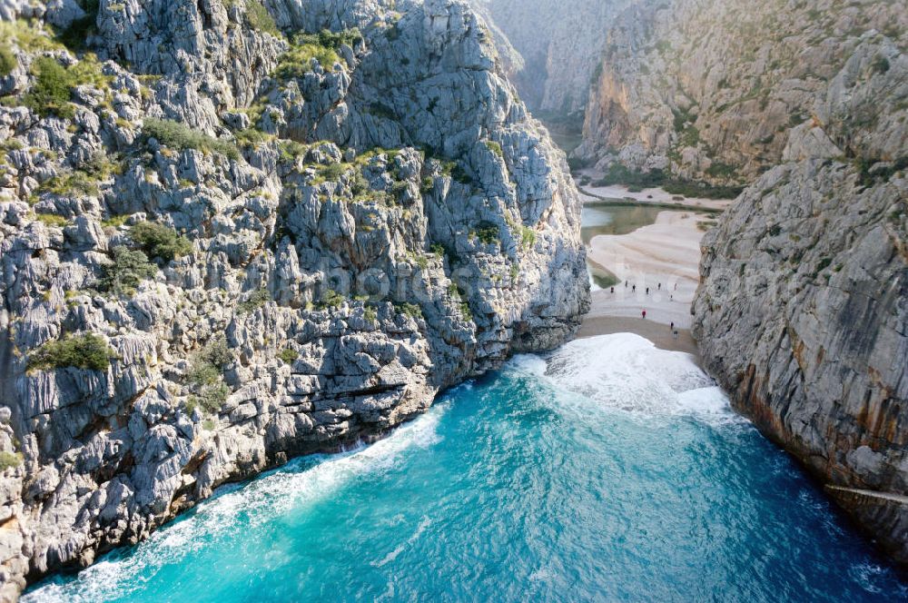 Aerial image ESCORCA OT SA CALOBRA - Canyon Torrent de Parlos on the rocky Mediterranean coast of the Spanish Balearic island of Mallorca