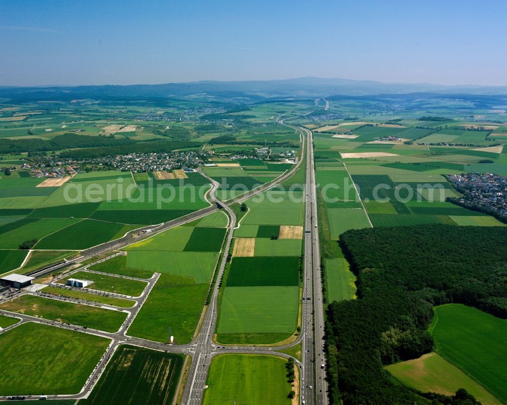 Dierdorf from the bird's eye view: The high speed rail line of Cologne-Rhine/Main and the highway Autobahn A3 near Dierdorf in the state of Rhineland-Palatinate. The closeness of both transit ways is one of the distinct characteristics of the rail line in this area. The Autobahn circles around villages and cities and the rail runs beneath them through tunnels. Outside of the residential and urban areas, both go together