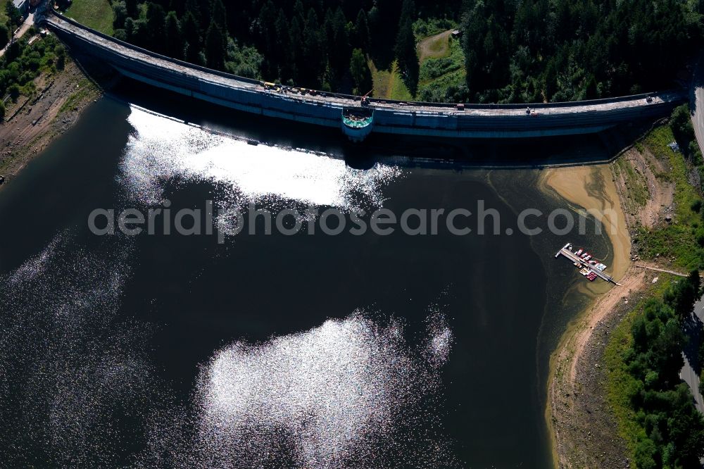 Forbach from above - The dam of Schwarzenbachtal in the Black Forest in the state of Baden-Württemberg. The dam is the most important building of the pump accumulator power plant Rudolf-Fettweis-Werk. The barrier lake collects water of the main area of the northern Black Forest. It is a beloved recreational site within the nature park of Black Forest Middle/North