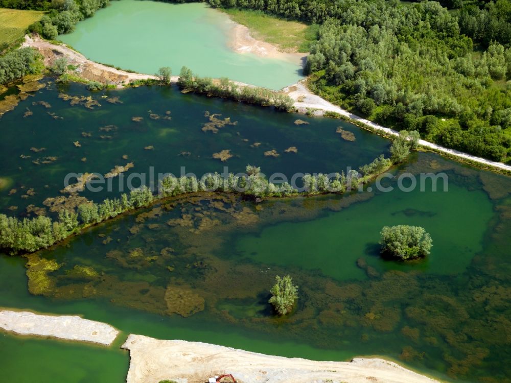 Brühl from the bird's eye view: The lakes near Brühl in the state of North Rhine-Westphalia. The city of Brühl is enclosed by lakes of different sizes. They came into existence primarly through the flooding of former mining pits and opencast pits. They are part of the Villeseen region and of the nature preserve Rhine Land. Today they are beloved leisure and tourist sites and used for swimming