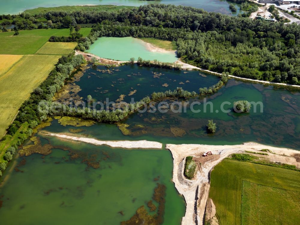 Aerial image Brühl - The lakes near Brühl in the state of North Rhine-Westphalia. The city of Brühl is enclosed by lakes of different sizes. They came into existence primarly through the flooding of former mining pits and opencast pits. They are part of the Villeseen region and of the nature preserve Rhine Land. Today they are beloved leisure and tourist sites and used for swimming