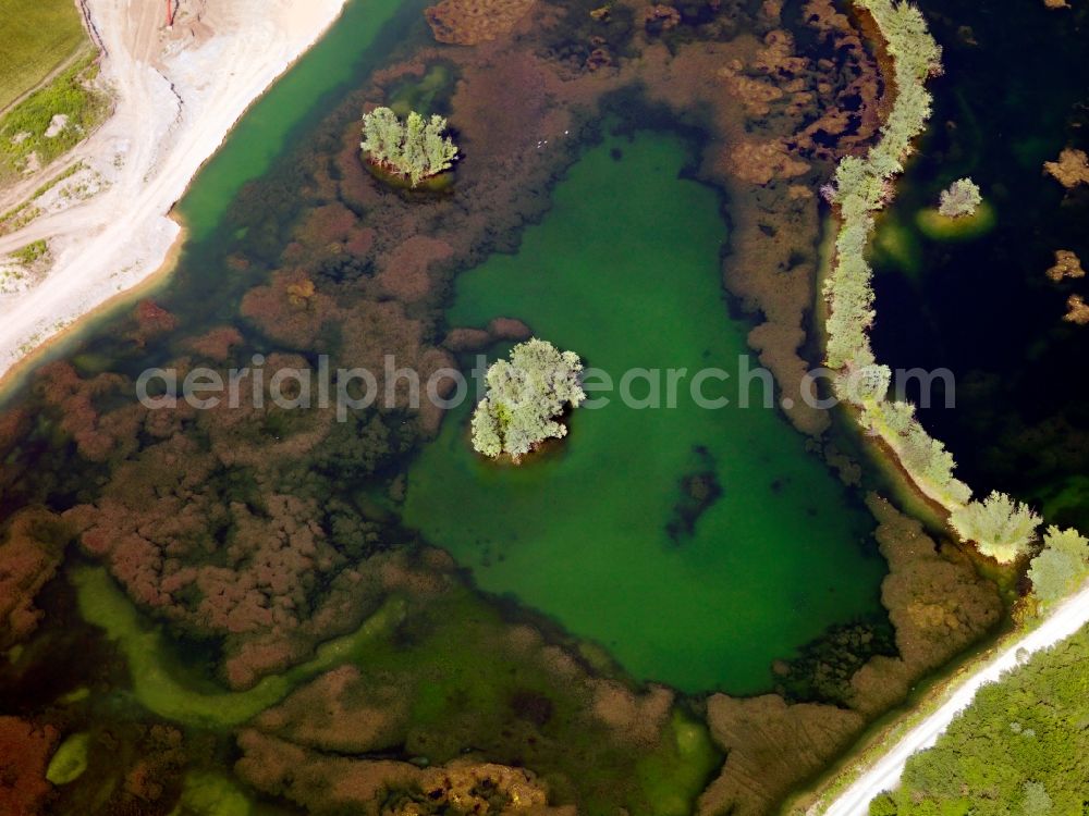 Aerial image Brühl - The lakes near Brühl in the state of North Rhine-Westphalia. The city of Brühl is enclosed by lakes of different sizes. They came into existence primarly through the flooding of former mining pits and opencast pits. They are part of the Villeseen region and of the nature preserve Rhine Land. Today they are beloved leisure and tourist sites and used for swimming