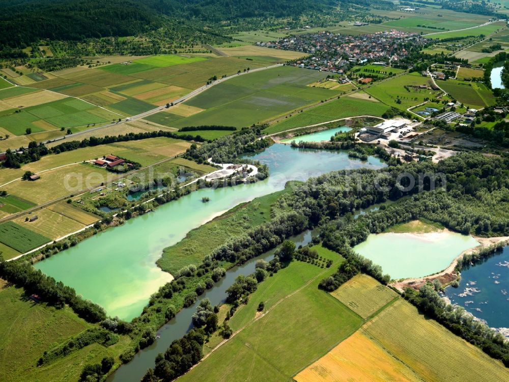 Brühl from above - The lakes near Brühl in the state of North Rhine-Westphalia. The city of Brühl is enclosed by lakes of different sizes. They came into existence primarly through the flooding of former mining pits and opencast pits. They are part of the Villeseen region and of the nature preserve Rhine Land. Today they are beloved leisure and tourist sites and used for swimming