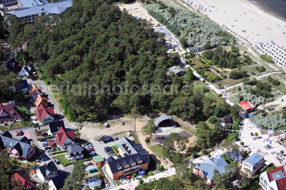 Aerial photograph Trassenheide - View at the stage Kurmuschel in the colony of the sea resort Trassenheide. Beside is the Haus zur Düne with its apartments that are partially hired for holiday