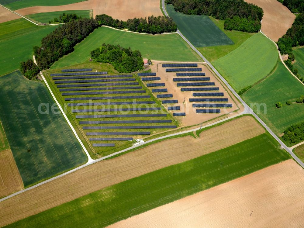 Forchheim from the bird's eye view: The solar energy plant in Forchheim in the Oberfranken region in the state of Bavaria. The photovoltaic plants are within and outside the city limits and are essential parts of the landscape