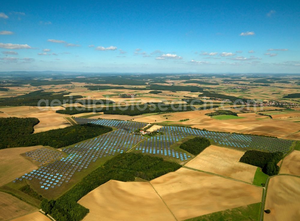 Aerial image Arnstein - The solar energy plant in Arnstein in the Unterfranken region in the district of Main - Spessart in the state of Bavaria. The large photovoltaic facility is a joint project of the companies Solon SE, the project and distribution company S.A.G. Solarstrom AG and the energy company E.ON Bayern AG