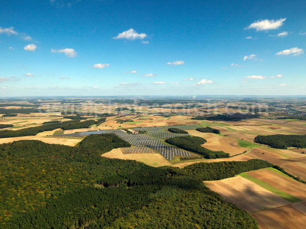 Aerial photograph Arnstein - The solar energy plant in Arnstein in the Unterfranken region in the district of Main - Spessart in the state of Bavaria. The large photovoltaic facility is a joint project of the companies Solon SE, the project and distribution company S.A.G. Solarstrom AG and the energy company E.ON Bayern AG