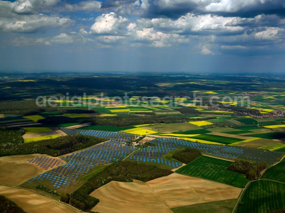 Aerial photograph Arnstein - The solar energy plant in Arnstein in the Unterfranken region in the district of Main - Spessart in the state of Bavaria. The large photovoltaic facility is a joint project of the companies Solon SE, the project and distribution company S.A.G. Solarstrom AG and the energy company E.ON Bayern AG