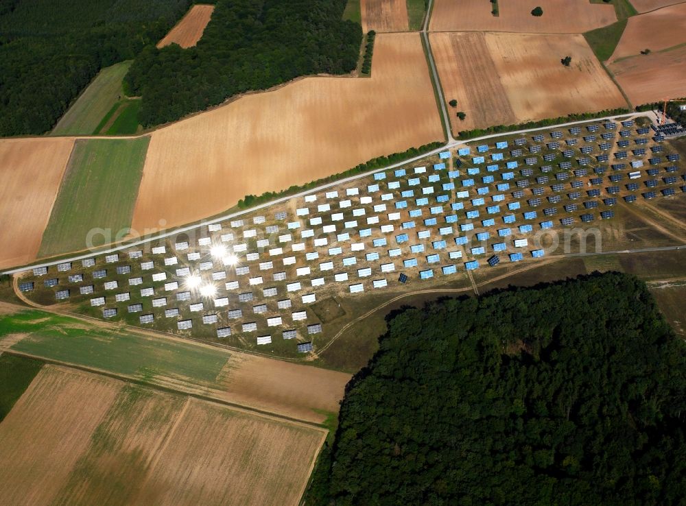 Aerial image Arnstein - The solar energy plant in Arnstein in the Unterfranken region in the district of Main - Spessart in the state of Bavaria. The large photovoltaic facility is a joint project of the companies Solon SE, the project and distribution company S.A.G. Solarstrom AG and the energy company E.ON Bayern AG