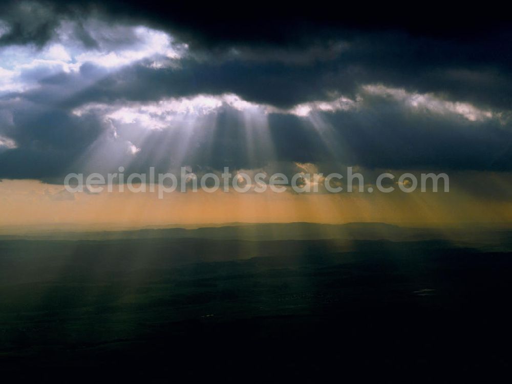 Erfurt from the bird's eye view: View of the sunlight pierced clouds above the Steiger forest near Erfurt in Thuringia