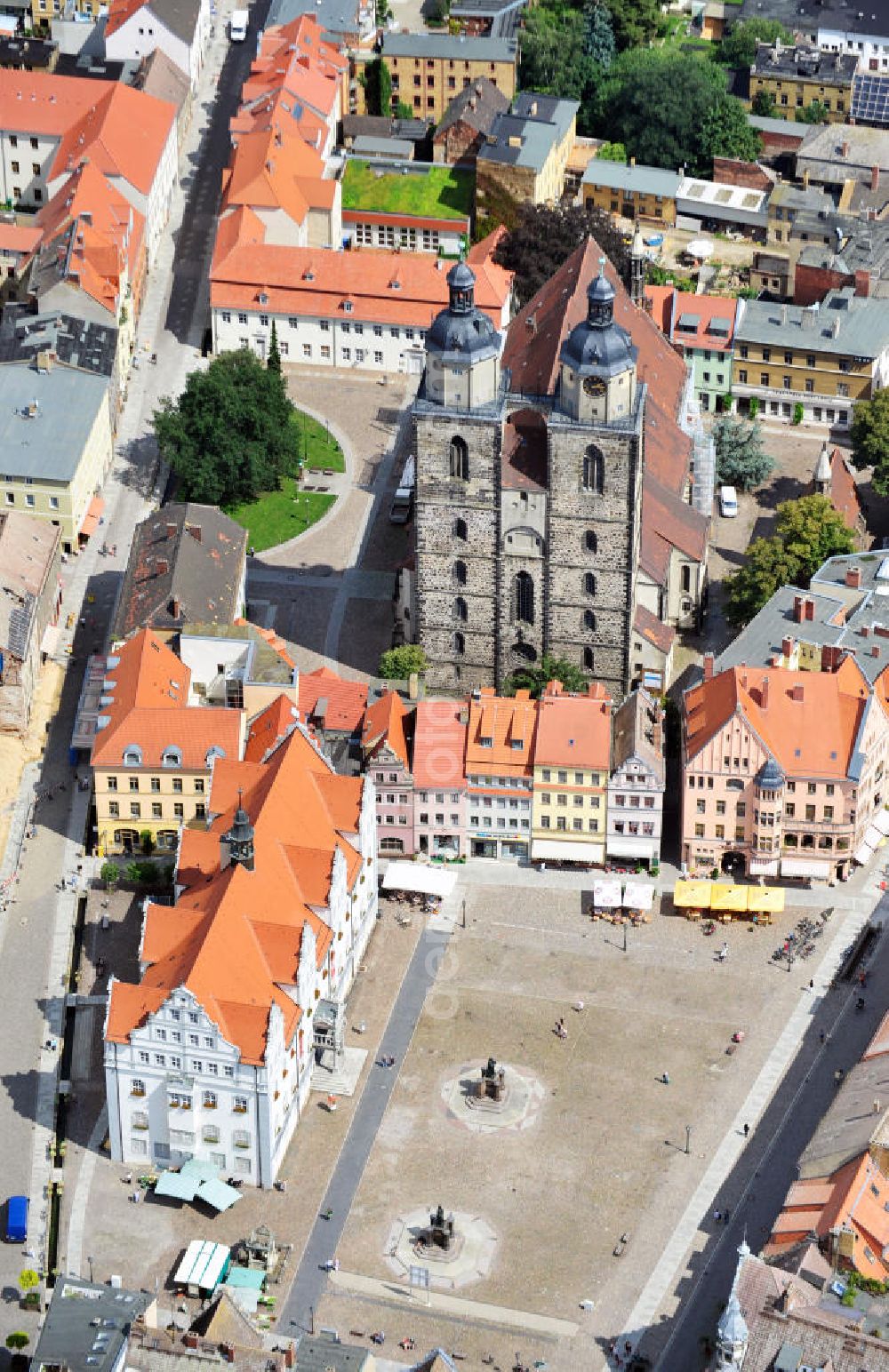 Aerial image Wittenberg - View of the city and parish church of St. Mary's on the market square of Wittenberg. As a church of the priests Martin Luther and Johannes Bugenhagen during Reformation, it has the status as a World Heritage Site by UNESCO since 1996. At the market place, the monuments of Martin Luther and Philipp Melanchton are located