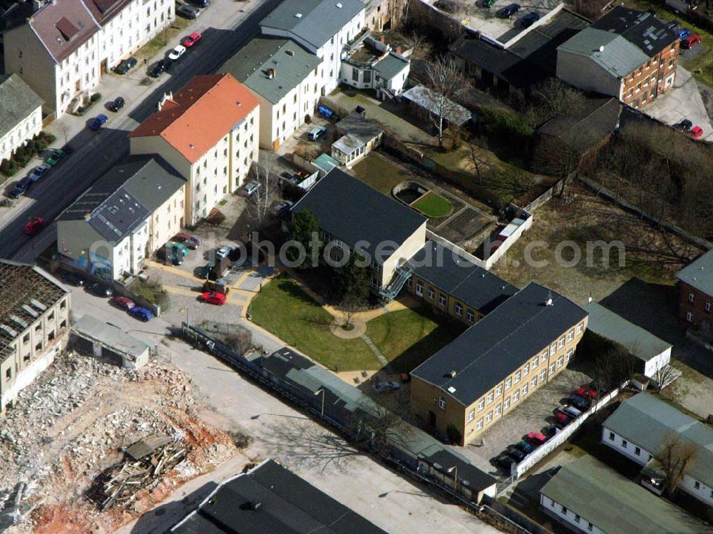 Bernau from the bird's eye view: 06.04.2006 Bernau; Die Stadtbibliothek Bernau steht als Medien- und Informationszentrum allen Bürgerinnen und Bürgern offen. Sie finden uns in den Räumen eines restaurierten Fabrikgebäudes auf dem Kulturhof an der Breitscheidstraße 43 b. 16321 Bernau bei Berlin, Telefon: (0 33 38) 76 35 20, Fax: (0 33 38 ) 76 35 21, E-Mail: stadtbibliothek@bernau-bei-berlin.de