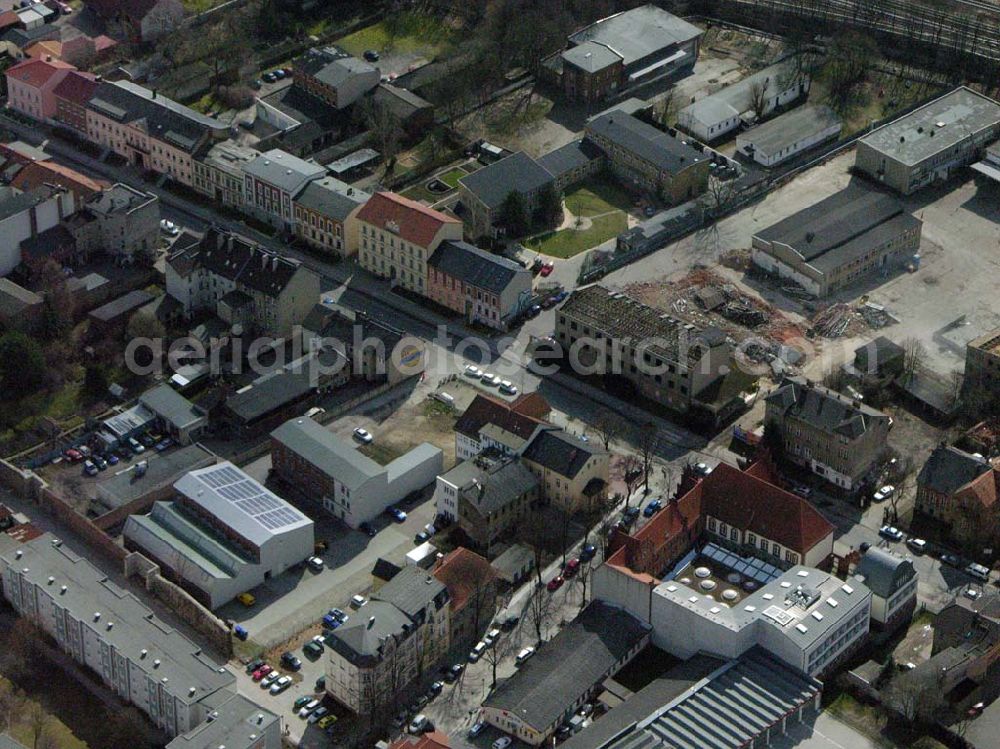 Bernau from the bird's eye view: 06.04.2006 Bernau; Die Stadtbibliothek Bernau steht als Medien- und Informationszentrum allen Bürgerinnen und Bürgern offen. Sie finden uns in den Räumen eines restaurierten Fabrikgebäudes auf dem Kulturhof an der Breitscheidstraße 43 b. 16321 Bernau bei Berlin, Telefon: (0 33 38) 76 35 20, Fax: (0 33 38 ) 76 35 21, E-Mail: stadtbibliothek@bernau-bei-berlin.de;
Ausserdem zu sehen die Klementstraße in der sich die AOK und Knut befindet.