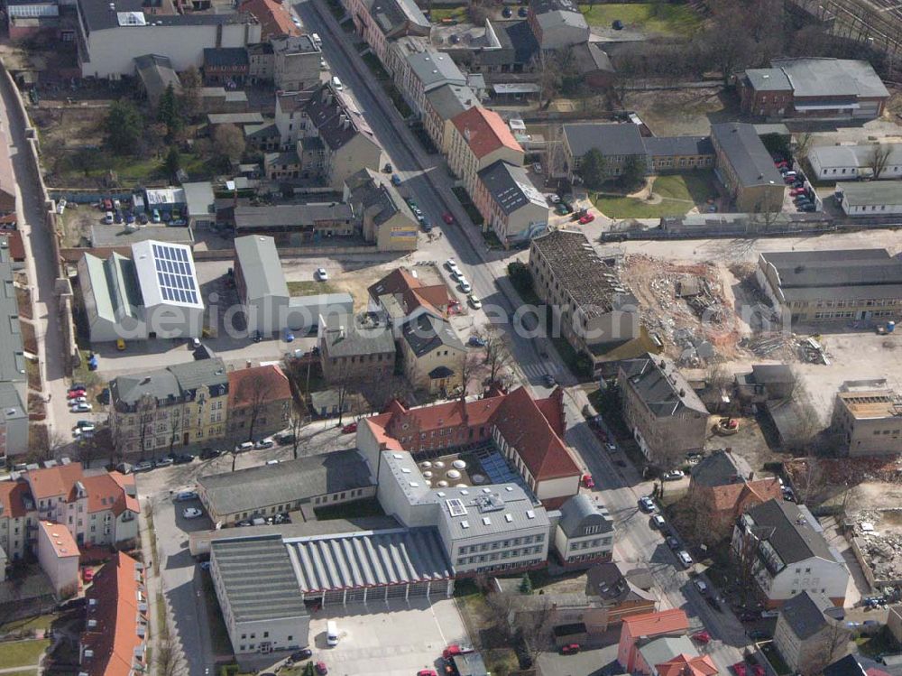 Aerial image Bernau - 06.04.2006 Bernau; Die Stadtbibliothek Bernau steht als Medien- und Informationszentrum allen Bürgerinnen und Bürgern offen. Sie finden uns in den Räumen eines restaurierten Fabrikgebäudes auf dem Kulturhof an der Breitscheidstraße 43 b. 16321 Bernau bei Berlin, Telefon: (0 33 38) 76 35 20, Fax: (0 33 38 ) 76 35 21, E-Mail: stadtbibliothek@bernau-bei-berlin.de;
Ausserdem zu sehen die Klementstraße in der sich die AOK und Knut befindet.