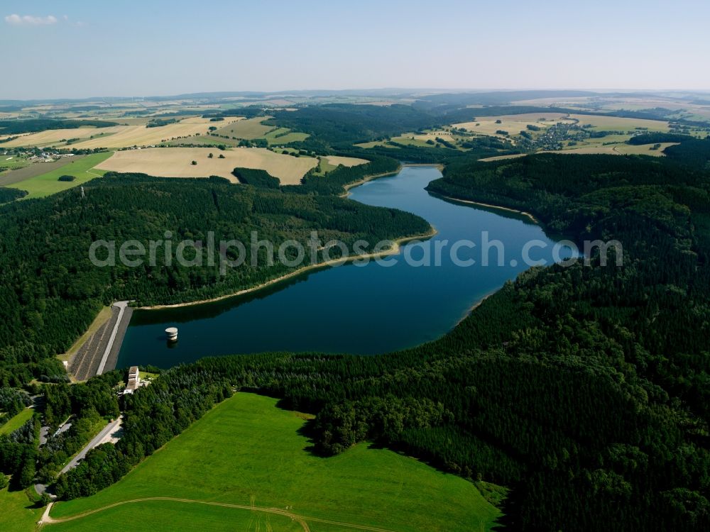 Lichtenberg/Erzgebirge from above - The dam in the district of Lichtenberg in the Erz Mountains in the state of Saxony. The dam is used for drinking water supply, for flooding protection and to produce power. The tower behind the dam is used to take water from the barrier lake