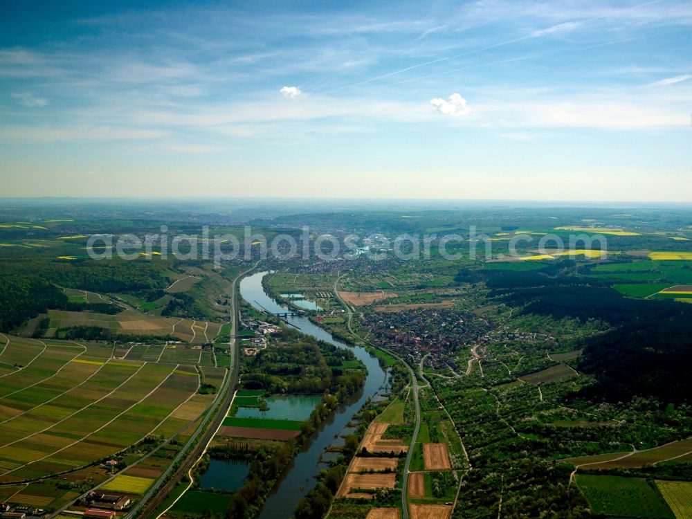 Thüngersheim from above - The surrounding landscape of Thüngersheim in the state of Bavaria. Thüngersheim is located on the river Main in Lower Franconia. The town is dominated by viniculture and vineyards. The nature reserve and wildlife sanctuary Höhfeldplatte is located around the town and forms the hills running upwards from the river