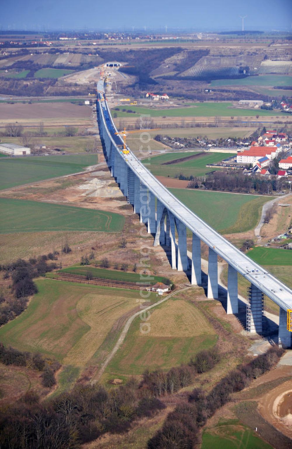 Aerial image Karsdorf - Construction of the Unstruttalbrücke bei Karsdorf. The concrete viaduct is an integral prestressed concrete box girder bridge with 6 continuous beams with 4 arcs and will reach 2.7 km in length. The new ICE - line of the project VDE 8 should go into operation in 2015. The building companies are Alpine Bau AG and Berger Bau GmbH. The designs come from DB ProjektBau GmbH, Structural Engineering, and Schlaich, Berger & Partner. In 2013, the work to be completed