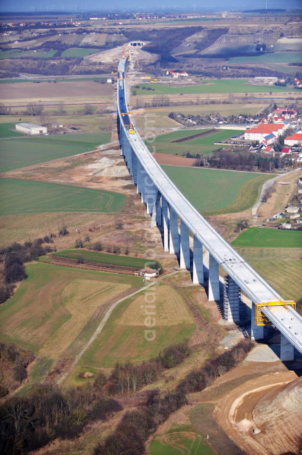 Aerial photograph Karsdorf - Construction of the Unstruttalbrücke bei Karsdorf. The concrete viaduct is an integral prestressed concrete box girder bridge with 6 continuous beams with 4 arcs and will reach 2.7 km in length. The new ICE - line of the project VDE 8 should go into operation in 2015. The building companies are Alpine Bau AG and Berger Bau GmbH. The designs come from DB ProjektBau GmbH, Structural Engineering, and Schlaich, Berger & Partner. In 2013, the work to be completed