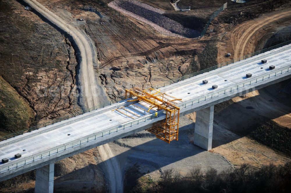 Aerial image Karsdorf - Construction of the Unstruttalbrücke bei Karsdorf. The concrete viaduct is an integral prestressed concrete box girder bridge with 6 continuous beams with 4 arcs and will reach 2.7 km in length. The new ICE - line of the project VDE 8 should go into operation in 2015. The building companies are Alpine Bau AG and Berger Bau GmbH. The designs come from DB ProjektBau GmbH, Structural Engineering, and Schlaich, Berger & Partner. In 2013, the work to be completed