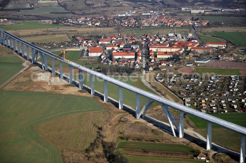 Aerial photograph Karsdorf - Construction of the Unstruttalbrücke bei Karsdorf. The concrete viaduct is an integral prestressed concrete box girder bridge with 6 continuous beams with 4 arcs and will reach 2.7 km in length. The new ICE - line of the project VDE 8 should go into operation in 2015. The building companies are Alpine Bau AG and Berger Bau GmbH. The designs come from DB ProjektBau GmbH, Structural Engineering, and Schlaich, Berger & Partner. In 2013, the work to be completed