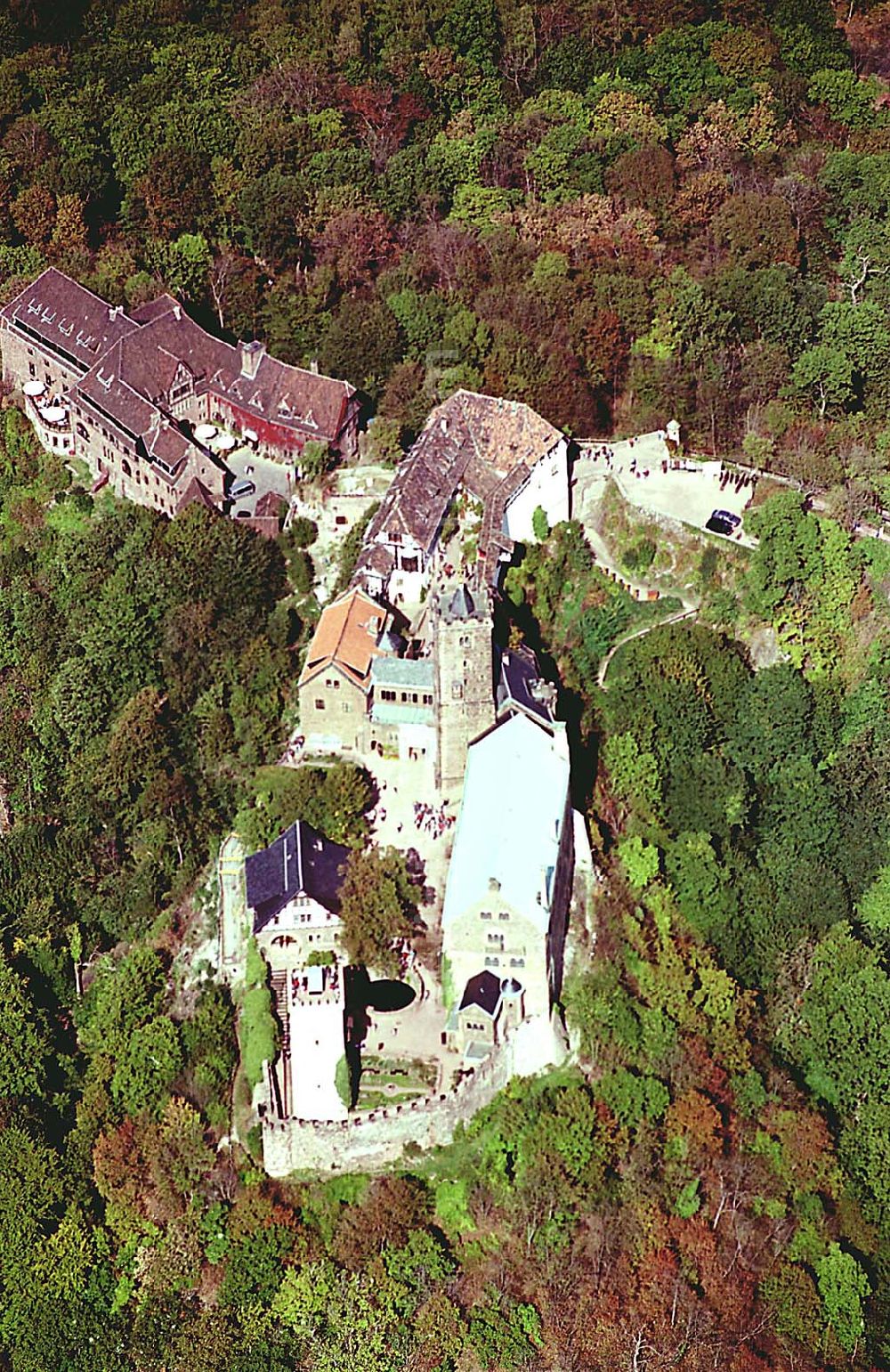 Eisenach/ Thüringen from above - Die Wartburg-Stiftung Eisenach Wartburg-Stiftung Eisenach, Auf der Wartburg-Stiftung Eisenach 99817 Eisenach Telefon: 0 36 91/25 00 Fax: 0 36 91/20 33 42 Email: info@wartburg-eisenach.de