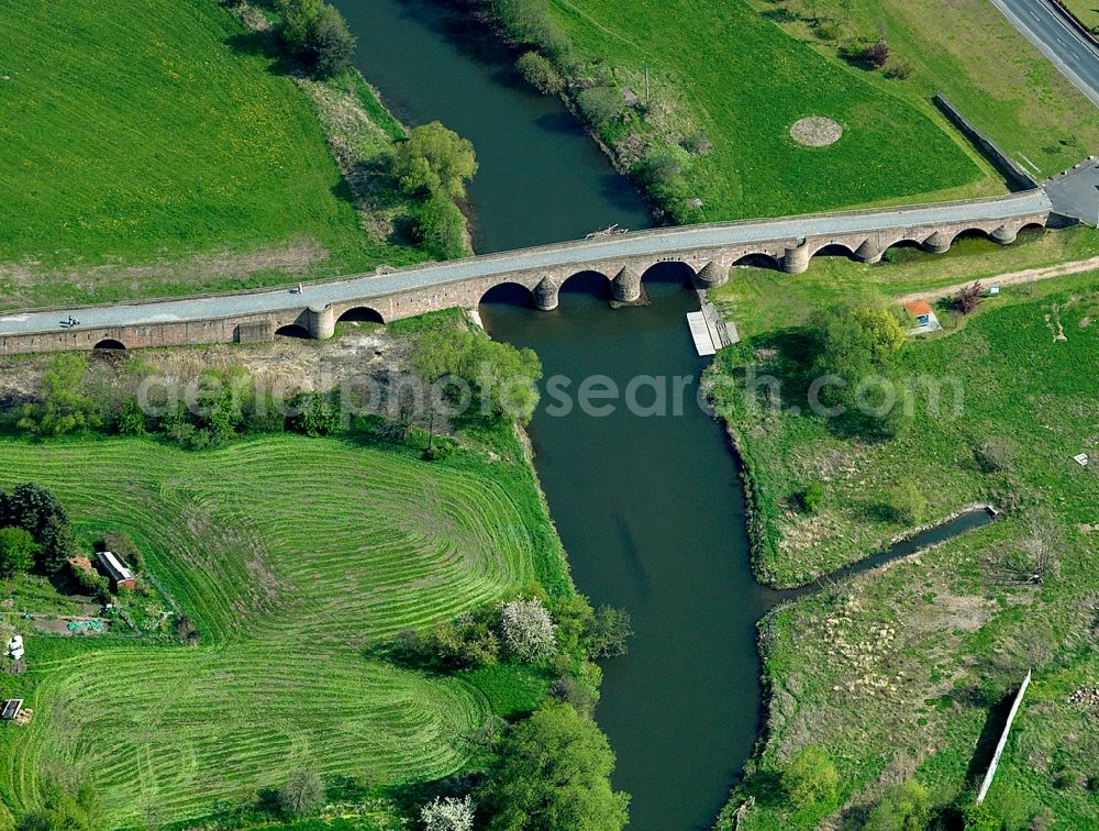 Aerial image Vacha - The bridge over the river Werra in Vacha in the state of Thuringia. It is also called Bridge of Unity and was built in the Middle Ages. It connects the states of Thuringia and Hessen. Built from natural stones, it consists of 11 arches