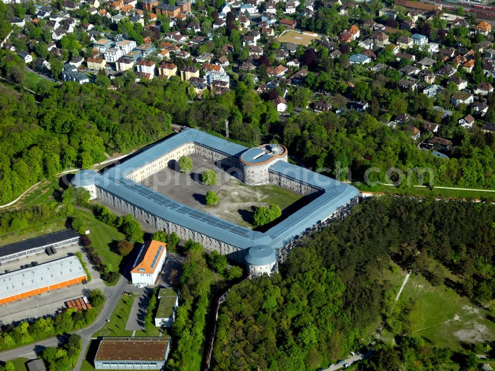 Ulm from the bird's eye view: The Fortress Wilhelmsburg of the Fortress of Ulm in Ulm in the state of Baden-Württemberg. It is the central building of the Fortress and lies in a forest in the East of Ulm. The Fortress is one of five federal fortresses and Europe`s largest fortress. It was built in the 19th century around the cities of Ulm and Neu-Ulm and consists of several forts, towers, fortresses and defense facilities