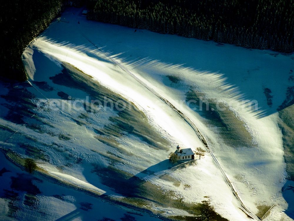 Weitnau from the bird's eye view: The snow-covered chapel Waltrams near Weitnau in the state of Bavaria