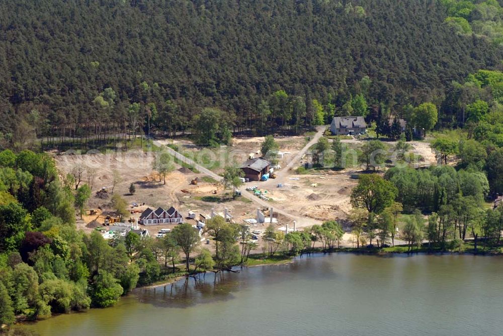 Aerial image Bad Saarow / Brandenburg - Direkt am größten See im Land Brandenburg, dem Scharmützelsee, entsteht das Feriendorf „Schlosspark Bad Saarow“ in der Region Berlin/Potsdam/Spreewald – inmitten einer der schönsten Naturlandschaften Mitteleuropas. Aktiv sein, gesund leben, sich verwöhnen lassen – der Kurort Bad Saarow an der Nordspitze des Scharmützelsees hat sich darauf eingestellt.