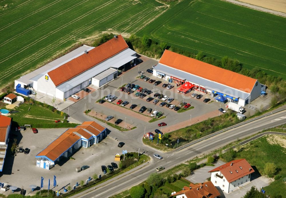 Fürstenzell from the bird's eye view: Branch of a discounter and non-food shops with parfplatz in Fuerstenzell in the state Bavaria, Germany