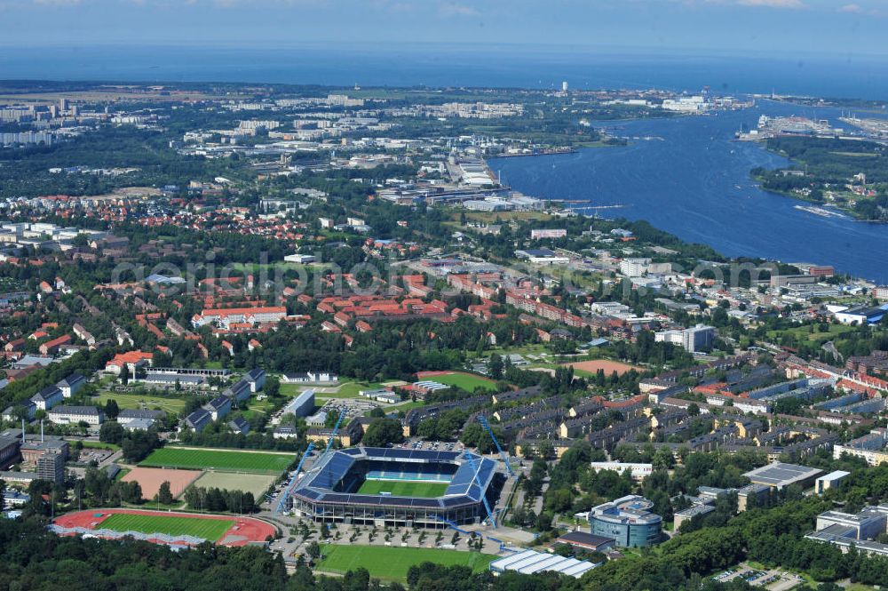 Aerial image Rostock - Die DKB-Arena (von 1954 bis 2007 Ostseestadion) ist ein Fußballstadion in der Hansestadt Rostock, das als Veranstaltungsort insbesondere für Heimspiele des F.C. Hansa Rostock genutzt wird. Die Ostseestadion GmbH & Co. KG mit dem F.C. Hansa Rostock als einzigem Kommanditisten ist Betreiber der DKB-Arena. Im Dezember 2010 wurde auf dem Dach der DKB-Arena eine Solaranlage fertiggestellt, deren Betreiber Paribus northenergy mit dieser rund 600.000 kWh Strom jährlich produzieren will. The DKB-Arena, the stadium is a football stadium in the Hanseatic city of Rostock, as the venue especially for home games of FC Hansa Rostock is used.