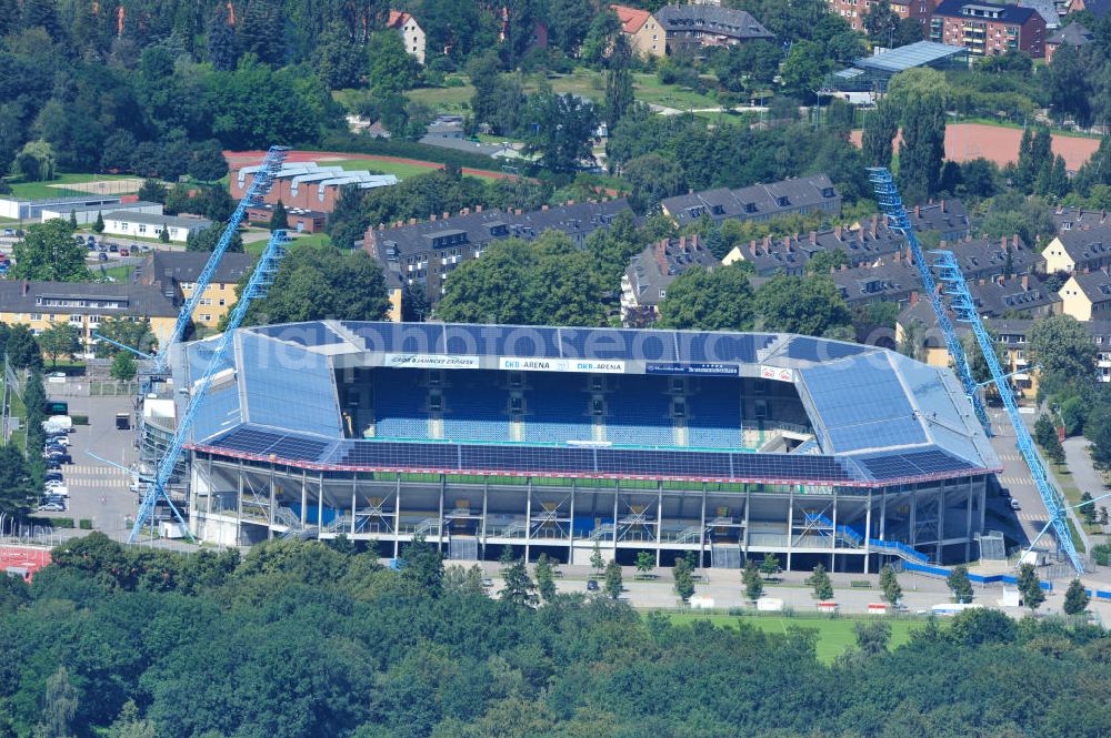 Aerial photograph Rostock - Die DKB-Arena (von 1954 bis 2007 Ostseestadion) ist ein Fußballstadion in der Hansestadt Rostock, das als Veranstaltungsort insbesondere für Heimspiele des F.C. Hansa Rostock genutzt wird. Die Ostseestadion GmbH & Co. KG mit dem F.C. Hansa Rostock als einzigem Kommanditisten ist Betreiber der DKB-Arena. Im Dezember 2010 wurde auf dem Dach der DKB-Arena eine Solaranlage fertiggestellt, deren Betreiber Paribus northenergy mit dieser rund 600.000 kWh Strom jährlich produzieren will. The DKB-Arena, the stadium is a football stadium in the Hanseatic city of Rostock, as the venue especially for home games of FC Hansa Rostock is used.