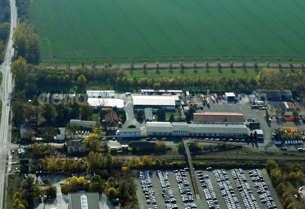 Aerial image Sülzetal - Building and production halls on the premises of DKM Dodendorfer Kunststoff- and Metalltechnik GmbH Am Bahnhof in the district Dodendorf in Suelzetal in the state Saxony-Anhalt, Germany