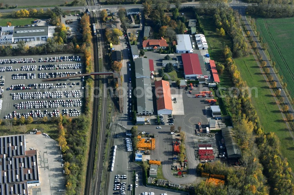 Sülzetal from the bird's eye view: Building and production halls on the premises of DKM Dodendorfer Kunststoff- and Metalltechnik GmbH Am Bahnhof in the district Dodendorf in Suelzetal in the state Saxony-Anhalt, Germany