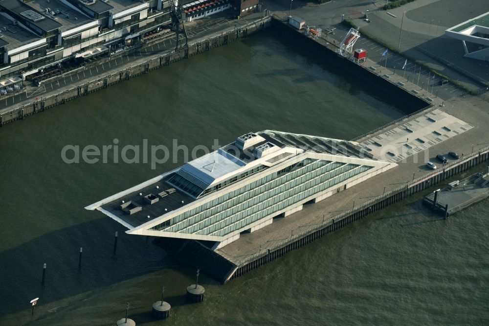 Hamburg from above - Dockland Office building in the Dockland region of the Free and Hanseatic city of Hamburg in Germany. The distinct building with its architecture, glass facade and step-like shape was designed by Hadi Teherani and is located on an artificial landstrip in the water