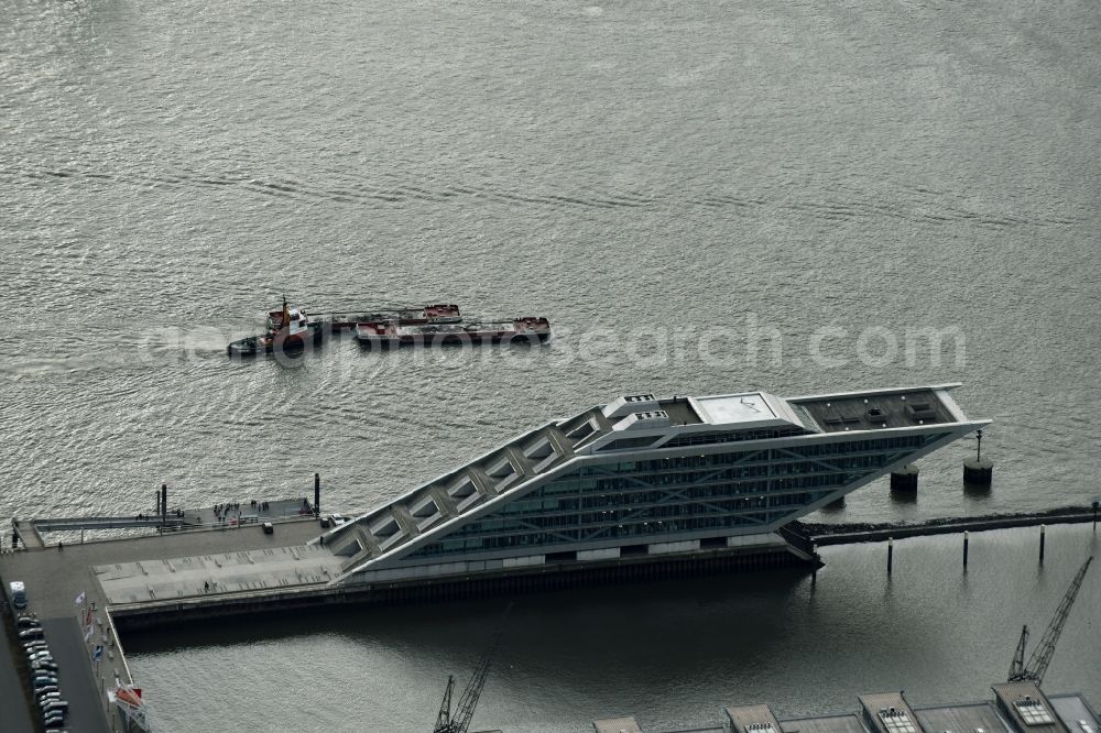 Hamburg from above - Dockland Office building in the Dockland region of the Free and Hanseatic city of Hamburg in Germany. The distinct building with its architecture, glass facade and step-like shape was designed by Hadi Teherani and is located on an artificial landstrip in the water