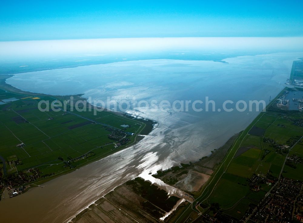 Aerial photograph Bunde - Dollart in Bunde in the state of Lower Saxony. The Dollart is a bay where the river Ems runs into the North Sea. It is located on the border between Germany and the Netherlands. View from the Dollart and the National Park Lower Saxony Wadden Sea to the North Sea